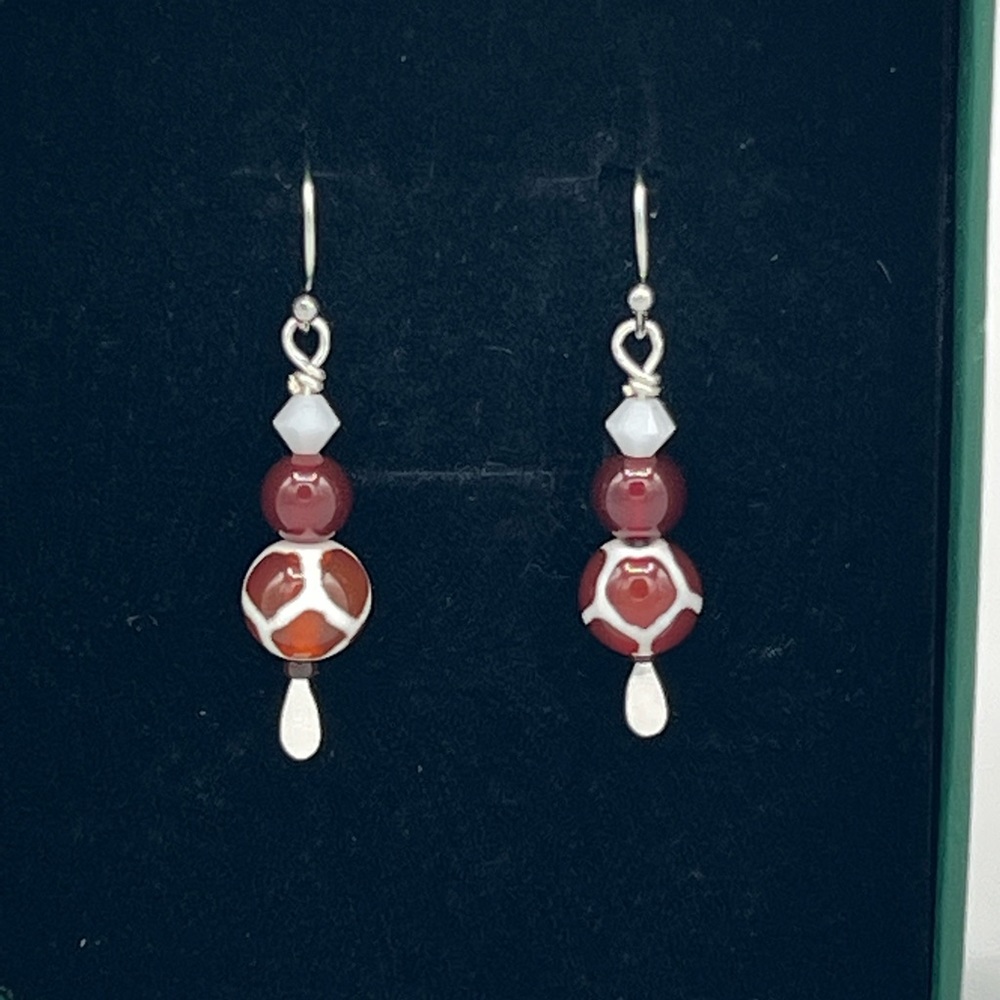 Animal print agate, carnelian. Swarovski earrings in maroon and white